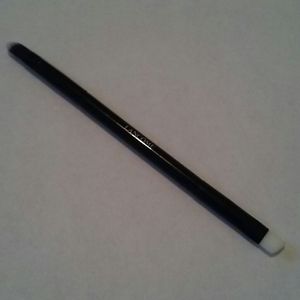 Lancome. Brush on each side to make-up eyebrows.